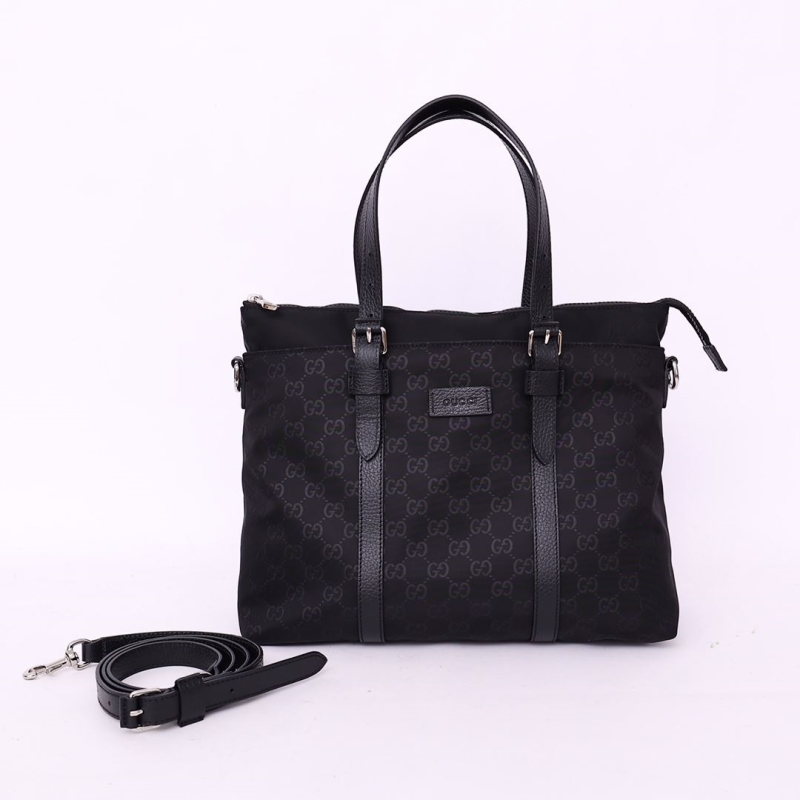 G*u*i shopping bags